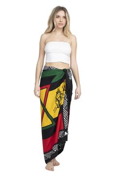 Description: Embrace your free spirit with this multi way Rasta Star Lions Sarong. This is the fashion accessory that can be used in 50 different ways. Wear it as a dress or skirt during the summer, then use it as a shawl or scarf during the winter. It can even serve as a beach towel for soaking up sun or as a throw for relaxing at home. The fabric is soft and light, keeping you comfortable no matter how you wear it. Pair with our other rasta items for a complete look. Details: Construction: 100 One Size Summer Festival Scarves, Bohemian Wrap Scarves For Summer, Casual Summer Festival Scarves, Bohemian Multicolor Scarf For Vacation, Bohemian Multicolor Scarves For Vacation, Multicolor Bohemian Scarf For Vacation, Summer Festival Scarf, Multicolor Bohemian Scarves For Vacation, Trendy Summer Vacation Scarves