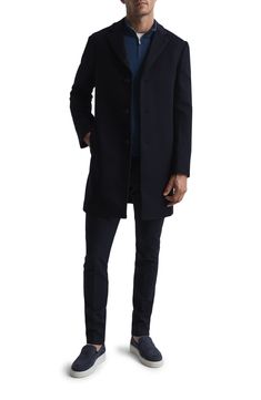 A soft and warm wool blend elevates a handsome overcoat with versatile appeal. 37" length (size Medium) Notched lapels 60% wool, 22% viscose, 18% nylon Dry clean Imported Fitted Single Button Wool Coat For Business, Classic Long Sleeve Sweater Coat For Business, Tailored Long Coat For Formal Occasions, Classic Wool Sweater Coat In Solid Color, Modern Wool Outerwear For Winter, Winter Pea Coat With Concealed Placket And Long Sleeves, Winter Pea Coat With Concealed Placket, Tailored Lapel Collar Winter Outerwear, Tailored Wool Business Coat With Suit Collar