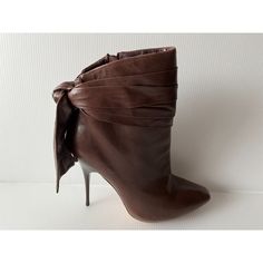 Women's Ankle Booties By Balenciaga Paris It Size: 39.5 Us Size: 9.5 Heel Height: 4.5" *Brown Leather Body *Bow Detail At Back *Side Zip Closure *Stiletto Heels Condition: In Very Good Condition With Some Signs Of Wear On Body (Bends In Leather, Small Marks/Scuffs). Soles Show Normal Signs Of Wear. Please See Photos For Additional Detail Please Let Me Know If You Have Any Additional Questions Thanks! 40295 Chic Heeled Boots With Leather Lining For Party, Chic Heeled Boots With Wrapped Heel And Round Toe, Chic Round Toe Heeled Boots With Wrapped Heel, Fitted Leather Booties, Chic Party Boots With Leather Lining, Brown Heeled Boots With Sculpted Heel For Party, Brown Ankle Heeled Boots For Party, Party High Heel Boots With Leather Lining, Party High Heeled Boots With Leather Lining