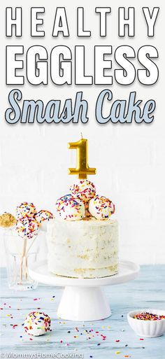 a cake with sprinkles on it and the words healthy eggless smash cake