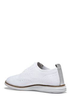 A pair of comfy, knit upper sneakers matches with anything in your closet for a sporty chic look. Sizing: True to size. B=standard width. Round toe. Wingtip and brogue detail. Lace-up closure. Back pull-tab. Removable padded insole. White sole. Imported Casual Summer Wingtip Lace-up Shoes, White Wingtip Lace-up Casual Shoes, White Casual Oxfords With Round Toe, Casual White Oxfords With Round Toe, White Lace-up Shoes With Textured Sole And Plain Toe, Casual Wingtip Oxford Lace-up Shoes, Casual Oxford Wingtip Lace-up Shoes, Casual Oxford-style Lace-up Wingtip Shoes, Casual Wingtip Oxfords In Oxford Material