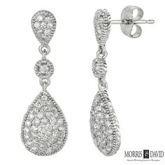 0.65 Carat Natural Diamond Pear Drop Earrings G Si 14k White Gold 100% Natural, Not Enhanced In Any Way Round Cut Diamond Earrings 0.65ct G-H Si 14k White Gold, 1.7 Grams, Pave Style 1 Inch In Height, 5/16 Inch In Width 94 Diamonds E5181wd All Our Items Are Available To Be Ordered In 14k White, Rose Or Yellow Gold Upon Request. All Chains Of Pendants And Necklaces Can Be Requested In 16'' Or 18'' Length. . This Item Is Proudly Handcrafted In The Usa. Perfect Gift On Any Occasion. Classic Hand Set Diamond Earrings, Classic Hand Set Dangle Diamond Earrings, Classic White Teardrop Earrings With Diamond Accents, White Hand Set Teardrop Diamond Earrings, White Teardrop Hand Set Diamond Earrings, Classic Pear-shaped Earrings With Pave Setting, Classic Pear-shaped Pave Setting Earrings, Classic Teardrop Earrings With Halo Design, Classic Pear-shaped Diamond Earrings With Pave Setting