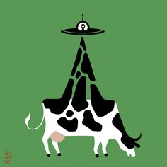 a black and white cow standing in front of a green background with an eye on it's head