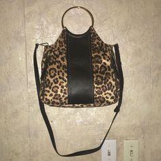 One Really Nice Black & Gold Animal Print International Concepts Handbag With Double Gold Ring Handles & Adjustable Removable Shoulder Strap, 2 Outside Front Zipper Sections, 1 Back Zipper Pocket, 4 Inside Sections With Snap Button Close Size 12.5”L X 11”W 100% Polyester Made In China Brand New Without Tags Leopard Print Everyday Bags With Handles, Everyday Leopard Print Bag With Handles, Leopard Print Shoulder Bag For Everyday Use, Everyday Leopard Print Shoulder Bag With Handles, Everyday Leopard Print Shoulder Bag, Leopard Print Tote Shoulder Bag With Gold-tone Hardware, Leopard Print Bags With Gold-tone Hardware For Shopping, Leopard Print Bag With Gold-tone Hardware For Daily Use, Gold Animals