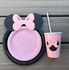 a minnie mouse plate and cup with straws