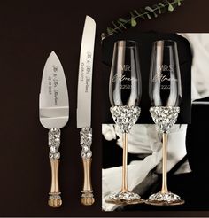 two champagne flutes and a knife with the words mr and mrs written on each one