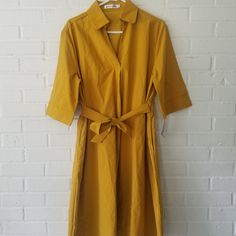 You Are Considering A Fabulous Dress From Madison (Via France) Size: M/L Condition: Nwt Beautiful Dress - Flattering And Such An Intense Mustard Color - Amazing!! Viscose/Poly. Midi Short Sleeve. Lovely! Underarm Flat 20 Length 38 Yellow V-neck Midi Dress For Work, Yellow Short Sleeve Shirt Dress For Daywear, Yellow Cotton Daywear Dress, Yellow Cotton Dress For Daywear, Yellow Knee-length Midi Dress For Work, Fitted Yellow Knee-length Shirt Dress, Yellow Fitted Midi Shirt Dress, Yellow Midi Shirt Dress For Work, Yellow Cotton Midi Dress With Short Sleeves