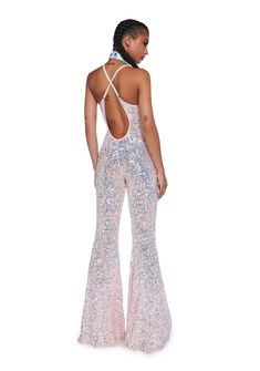 cuz you’ve got them mesmerized. This jumpsuit has a stretchy sequin construction, flare pants, an open back, and cross straps. Sequin Backless Jumpsuits And Rompers For Party Season, Sequin Backless Jumpsuits And Rompers For Night Out, Glamorous Stretch Sequin Jumpsuits And Rompers, Sequin Stretch Jumpsuits And Rompers For Party Season, 70s Jumpsuit, Club Jumpsuit, Glitter Jumpsuit, Sequin Jumpsuit, Free Socks