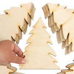 Unfinished Wood Pine Tree Cutout Shapes. These 36 Unfinished Wood Pine Tree Cutout Shapes are great for a variety of DIY holiday and everyday projects. They have been lightly sanded and are ready for your finish.    Bring fun dimension and flair to handmade greeting cards, Christmas ornaments, and other holiday arts and crafts projects.    Made of wood. Pine Tree Cutout, Wood Pine Tree, Holiday Arts And Crafts, Tree Cutout, Greeting Cards Christmas, Handmade Greeting Cards, Factory Direct Craft, Crafts Projects, Cards Christmas