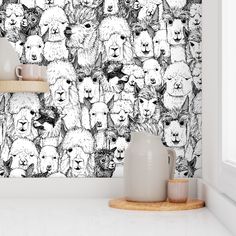 a wallpaper with many animals on it in a white and black color scheme,