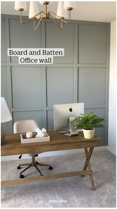 an office desk with a laptop computer on top of it and the words board and batten office wall above it