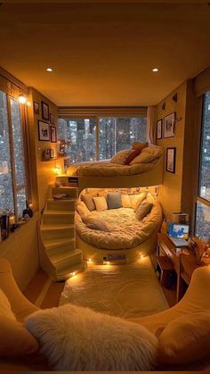 a living room filled with lots of furniture next to tall windows covered in light bulbs