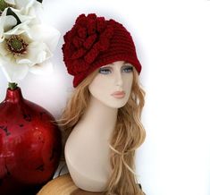 "Crochet Winter Hats If you want to buy, give unique crochet hats this shop is for you. Large flower covers one side of the hat. Beautiful, chic crochet hat would complement your outfit. This color on the listing is burgundy but you have many color choices to choose from. I make the hats fits 22\" adult average head unless request otherwise. Please make sure this size is right for you or let me know what size you need. Always smoke, pet free home." Crochet Hat Women, Women Winter Hats, Hats Crochet, Crochet Women, Chic Crochet, Crochet Winter Hats, Womens Hats, Women Hats, Hats Women