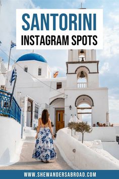 a woman in a blue and white dress is walking down the steps to a church