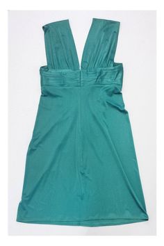 Size X-Small Green Sleeveless Dress Body 96% Acetate 4% Spandex Lining 84% Polyester 16% Spandex Slips on Pleated bust Plunge neckline 1 small pull on the front near bust and 1 on the back Underarm to underarm 14.5" Roomy waist & hip area Total length 34" Green Stretch Mini Dress For Formal Occasions, Green Fitted Sleeveless V-neck Dress, Fitted Green Sleeveless V-neck Dress, Green Formal Mini Dress With Stretch Fit, Green V-neck Elastane Dress, Green V-neck Stretch Sleeveless Dress, Green Stretch V-neck Sleeveless Dress, Green V-neck Sleeveless Stretch Dress, Fitted Sleeveless V-neck Dress With Ruched Detail