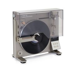 an old record player with its turntable removed from it's display case, on a white background