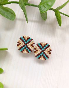 "Stud beadwork earrings in beige, brown, and turquoise colors. Traditional American earrings for women and for men. The earrings are handmade from Japanese beads Toho, using felt, a strong synthetic thread, a clasp of hypoallergenic metal, and leather. Measurements: Diameter of the earrings ≈ 0.75\" It will be a great gift, I send all jewelry in gift wrapping. You can also order earrings in the colors you like! Similar earrings are available in other colors. https://www.etsy.com/listing/13044303 Bohemian Brown Beaded Round Earrings, Bohemian Brown Round Earrings, Brown Bohemian Round Earrings, Bohemian Brown Beaded Earrings For Gift, Southwestern Brown Beaded Earrings As Gift, Southwestern Style Brown Beaded Earrings For Gift, Southwestern Style Brown Beaded Earrings Gift, Artisan Brown Beaded Earrings For Pierced Ears, Adjustable Brown Earrings With Colorful Beads