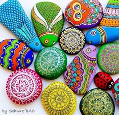 colorful painted rocks with designs on them