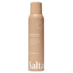 This dry shampoo revitalizes and refreshes hair with no washing necessary. Formulated with a fast-absorbing powder blend of shea butter coated rice starch, bamboo and lotus that absorb excess oil, sweat and impurities while adding volume and bounce. Developed for all hair types and colors. Safe for color-treated locks. Warm and golden, like sunkissed skin. Santal Bloom is evocative and simply irresistible.Shake vigorously. Hold bottle 6-10 inches away from scalp and spray onto roots. Allow to ab Powder Shampoo, Dry Hair Shampoo, Sunkissed Skin, Dry Shampoo Hairstyles, Simply Irresistible, All Hair Types, Hair Shampoo, Dry Shampoo, Dry Hair