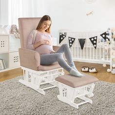 a pregnant woman sitting in a rocking chair with her feet up on the foot rest