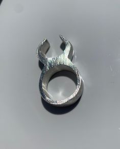 Completely Handmade, Completely with Sterling Silver  Available in size 8! Sterling Silver Devil Horns Ring with .925 stamp on inside 7.5mm wide band  Method: Lost wax Cast 22.29 g Sterling Silver Horn Ring, Devil Horns, Ring Ideas, Lost Wax Casting, Lost Wax, Wide Bands, Rings Statement, Sterling Silber, Statement Rings