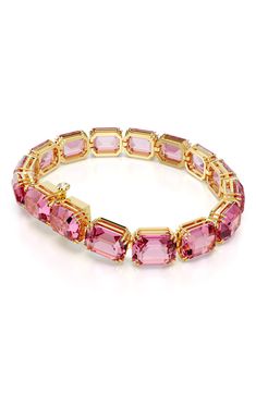 Octagon-cut crystals in a pretty pink hue glisten on this red carpet–worthy bracelet secured with a hidden closure. 7 1/2" length; 1/4" width Tongue-and-groove closure Swarovski crystal/goldtone plate Imported Swarovski Millenia, Latest Bracelets, Wave Bracelet, Swarovski Bracelet, Diamonds And Gold, Pink Bracelet, Blue Bracelet, Crystal Bracelet, Pink Crystal