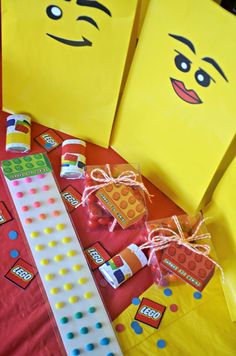 some yellow bags with lego faces on them