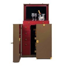 a red cabinet with two wine glasses in it