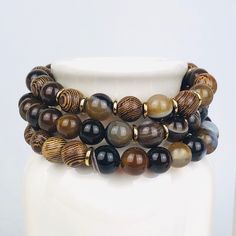 Each Bracelet Is Hand Strung On Extra Thick, Durable Stretch Cord. Bracelets Are 'One Size Fits Most' And Are Measured For A 6-7" Wrist Size For Women. *Custom Sizes Now Available Per Request. *Includes 3 Bracelets *Wood Beads & Coffee Agate Beads Agate: The Energies Of Agate Will Calm, Elevate, Uplift You And Will Make Sure That Positive Energies Flow Thru You. Hand Wrapped Agate Beaded Bracelets, Brown Agate Hand-strung Bracelets, Brown Agate Beaded Bracelets, Hand-strung Brown Agate Bracelets, Brown Agate Beaded Bracelets For Healing, Elegant Brown Agate Bracelets, Brown Agate Casual Jewelry, Casual Brown Agate Jewelry, Handmade Brown Agate Beaded Bracelets