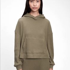 Shop Gap's Waffle-Knit Hoodie: Soft Waffle-Knit., Long Sleeves., Hooded Neckline., Front Kanga Pocket Winter Ribbed Hoodie For Loungewear, Hooded Ribbed Tops For Loungewear, Ribbed Hooded Top For Loungewear, Ribbed Hooded Hoodie For Loungewear, Ribbed Hoodie For Loungewear, Cozy Ribbed Hooded Top, Casual Ribbed Hooded Top, Sporty Winter Sweatshirt With Ribbed Detail, Sporty Ribbed Sweatshirt For Winter