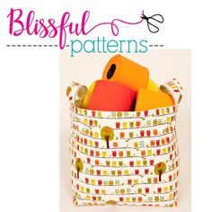 a basket filled with lots of different types of fabric and scissors in front of the words, blissful patterns