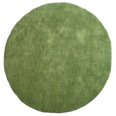 a round rug with a green color on the top and bottom part of it's surface