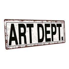 a sign that says art dept on it with the word art dept in black and white