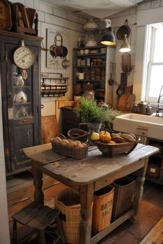 an old fashioned kitchen table with baskets on it