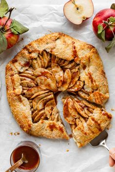 an apple pie is cut into slices and ready to be eaten