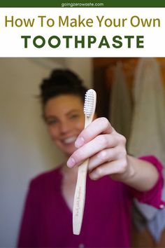 a woman holding up a toothbrush with the words how to make your own toothpaste