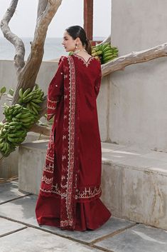 Gota Embroidered Kameez Trouser Pakistani Eid Dress is a perfectly stitched masterpiece that has the perfect balance of royalty and grace. Premium lawn fabric and lavish details of gota make this stunning Pakistani Dress an epitome of beauty and your foremost priority for the festive occasion. Detailed Description: SKU: PS1755 Detailing: Embroidery, Threads, Gota Color: Maroon Fabric: Lawn, Organza Design: Fully Embroidered dress Event: Festive, Party wear Eid Dress, Pakistani Designer Clothes, Eid Dresses, Embroidered Border, Pakistani Dress, Lace Side, Beautiful Suit, Lawn Fabric, Lawn Shirts