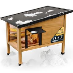 a table that has some kind of food in it on top of snow covered ground