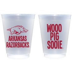 two plastic cups with the words, woop pig sooe and arkansas razorbacks on them