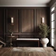 a living room with wood paneling and a bench in the corner next to a window