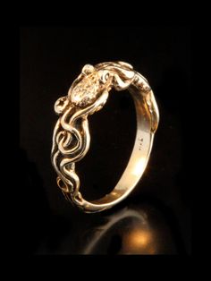 image 0 Tentacle Jewelry, Tentacle Ring, Slytherin Jewelry, Unique Ear Cuffs, Tentacles Ring, Wedding Band Tattoo, Dragon Ear Cuffs, Snake Rings, Gothic Wedding Rings