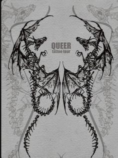 an artistic drawing of two dragon wings with the words queen written on it's back