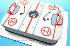 a hockey themed cake with the number ten on it