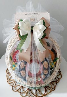 a basket filled with lots of food on top of a table