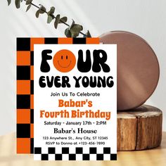 an orange and black birthday party card with a smiley face on it's front