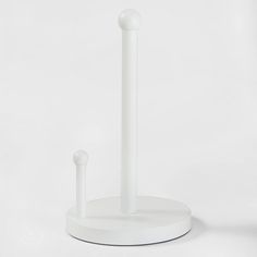 a white object with two poles on it's side and one pole in the middle