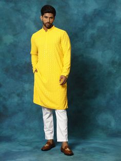 VM By VASTRAMAY Men's Yellow Rayon Schiffli Kurta And Pant Set Experience the vibrant charm of traditional Indian fashion with this yellow rayon kurta and pant set by VM from VASTRAMAY. Crafted with intricate Schiffli embroidery, this set exudes elegance and sophistication, perfect for any festive occasion or cultural event. Features Intricate Schiffli embroidery Comfortable rayon fabric Stylish and traditional design Perfect for festive occasions Specifications Color: Yellow Material: Rayon Siz Schiffli Kurta, Cultural Events, Intricate Embroidery, Sleeveless Jacket, Traditional Indian, Rayon Fabric, Full Sleeves, Pant Set, Mandarin Collar