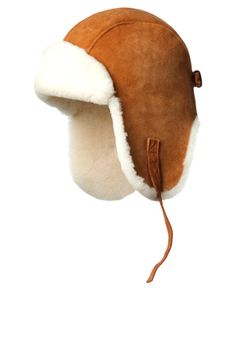 Double-faced shearling aviator with back strap and buckle. Shell: 100% Shearling Lining: NA Made in Canada Washing Instructions: Fur clean only Aviator Hat Outfit, Crown Cap, Luxury Hats, Ivy Cap, Aviator Hat, Black Brick, Bear Hat, Fur Hat, Earmuffs