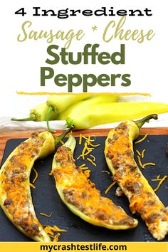 stuffed peppers on a cutting board with text overlay reading 4 ingredient sausage cheese stuffed peppers