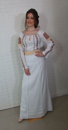 This dress, decorated with traditional romanian motifs is  made from linen fabric and decorated with silk thread machine embroidery.  The dress is made of 2 pieces, skirt and blouse, which can be worn separately   Dress is made to order according to the size indicated by you. Please indicate following measures: Bust line- Waist line- Hips line- Dress length from waist- in inch or in cm.  Are the points  2, 4, 5, 6 in the measuring guide. (you can find it in pictures) For the custom made dress it Folk Style Embroidered Dress For Traditional Ceremonies, Folk Style Fitted Embroidered Dress, Folk Style Fitted Embroidered Dress With Border, Folk Style Fitted Embroidered Dress With Embroidered Border, Fitted Folk Style Embroidered Dress With Embroidered Border, Bohemian White Embroidered Dress With Woven Motifs, White Bohemian Embroidered Dress With Woven Motifs, White Folk Embroidered Dress With Woven Motifs, Folk Style White Embroidered Dress For Traditional Ceremonies